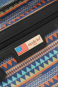 Close-up view of the Nicole Lee USA logo on the Bosque de Amor denim tote bag featuring colorful geometric patterns.