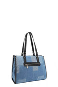 Bosque de Amor denim tote bag featuring a stylish patchwork design with black leather straps.