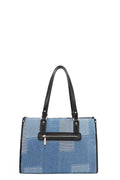 Bosque de Amor denim tote bag featuring a chic design with a combination of durable cotton denim and stylish black accents.