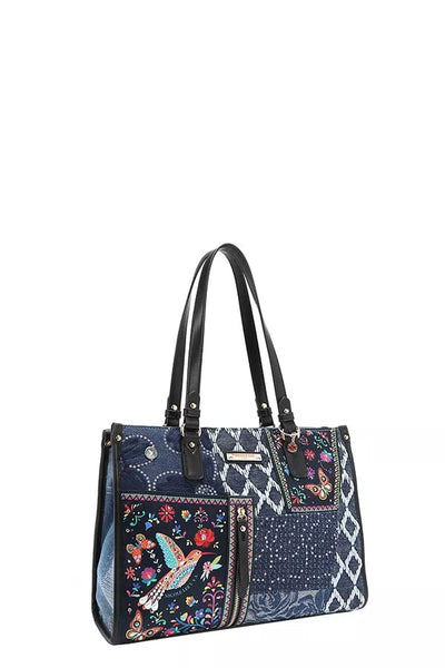 Bosque de Amor denim tote bag featuring floral and bird embroidery with black handles.
